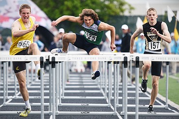 Glacier's Drew Deck competes in the boys 110 meter hurdles at the Class AA State track and field meet at Legends Stadium on Saturday. (Casey Kreider/Daily Inter Lake)