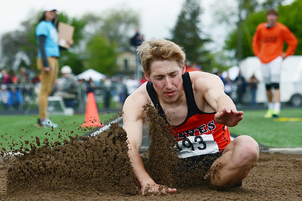 Flathead's Seth Moon competes in the triple jump at the Class AA State track and field meet at Legends Stadium on Saturday. (Casey Kreider/Daily Inter Lake)