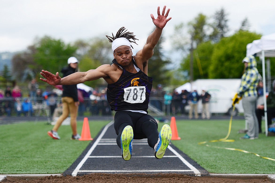 Missoula Sentinel's Elias DeWaters competes in the triple jump at the Class AA State track and field meet at Legends Stadium on Saturday. (Casey Kreider/Daily Inter Lake)