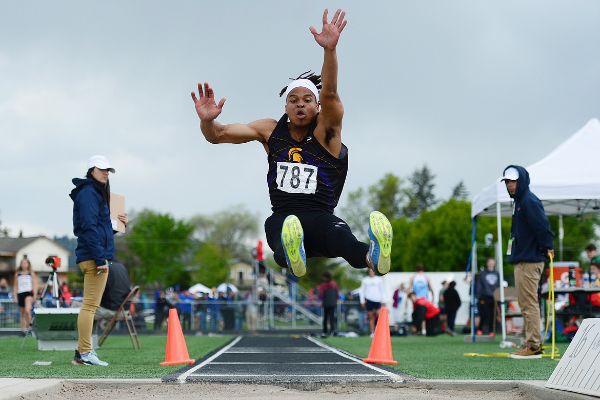 Missoula Sentinel's Elias DeWaters competes in the long jump at the Class AA State track and field meet at Legends Stadium on Friday. (Casey Kreider/Daily Inter Lake)