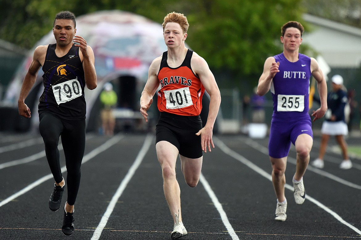 Flathead's Chance Sheldon-Allen runs in the boys' 200 meter dash at the Class AA State track and field meet at Legends Stadium on Friday. (Casey Kreider/Daily Inter Lake)