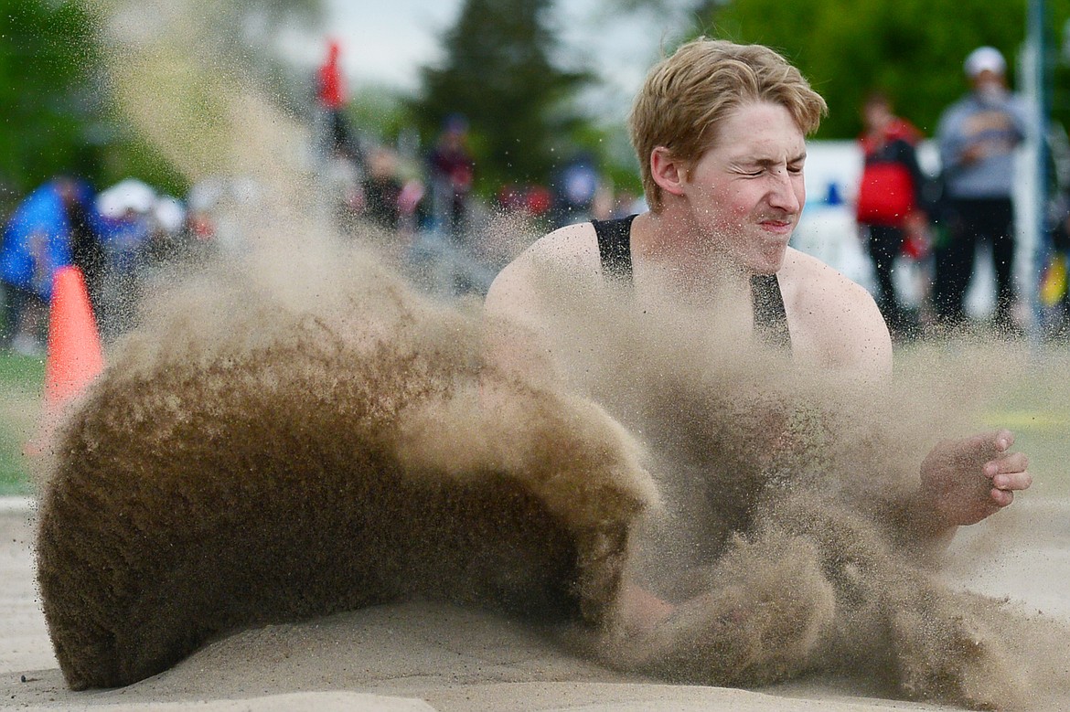 Flathead's Seth Moon competes in the long jump at the Class AA State track and field meet at Legends Stadium on Friday. (Casey Kreider/Daily Inter Lake)