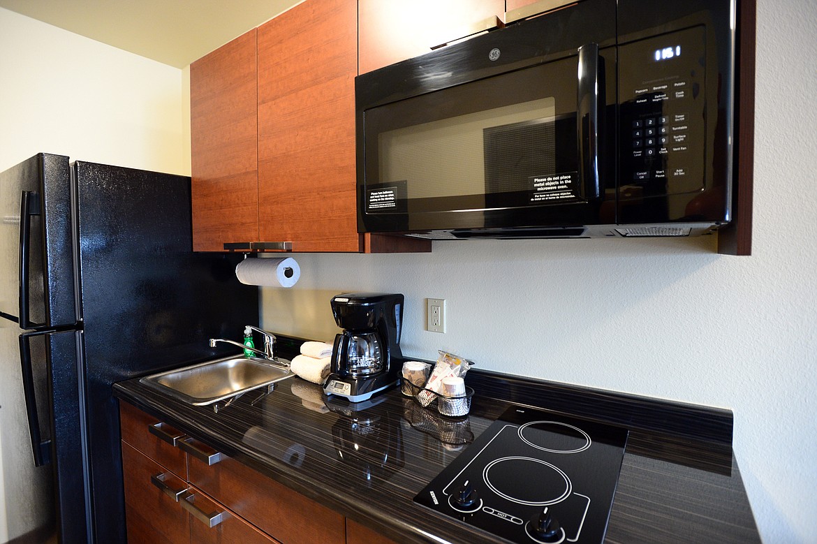Each room at My Place Hotel features a kitchenette that includes a refrigerator with freezer, microwave, two-burner cooktop and coffee maker. (Casey Kreider/Daily Inter Lake)