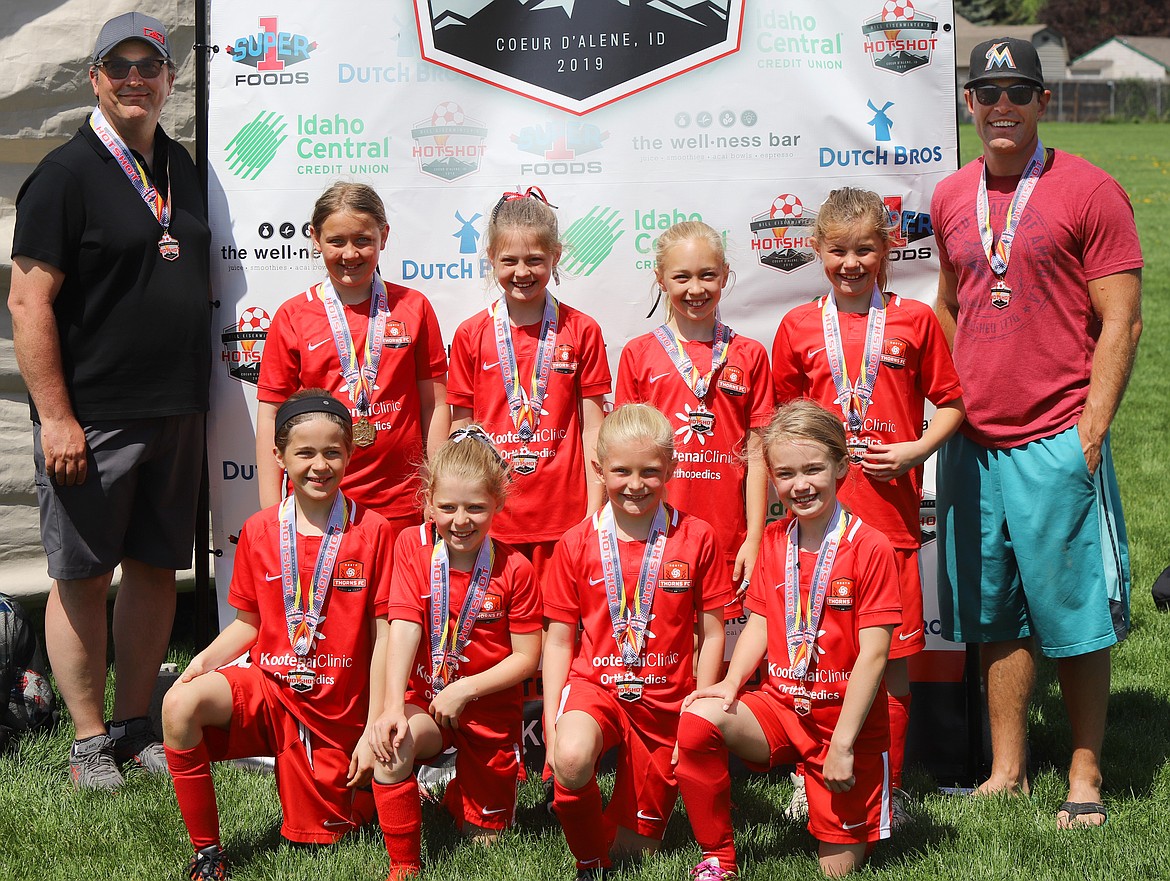 Courtesy photo
The Thorns North FC 09 Yellow girls soccer team took first place in the U10 Silver Bracket at the Bill Eisenwinter Hot Shot Tournament May 10-12. In the front row from left are Savannah Spencer, Cadyn Leonard, Ashley Yates and Clara Schmidt; and back row from left, coach Eric Burkholder, Addison Karoblis, Chloe Burkholder, Olivia Smith, Anabel Bowie and coach Nate Bowie.