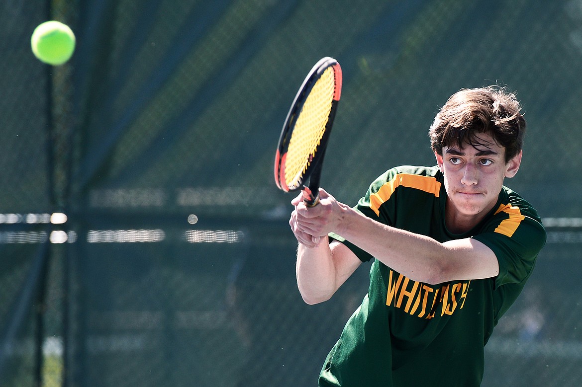 Whitefish&#146;s Jayce Cripe hits a return in a boys&#146; singles match against Miles City&#146;s Dalton Polesky at the Class A State Tennis Tournament at Flathead Valley Community College on Thursday. (Casey Kreider/Daily Inter Lake)