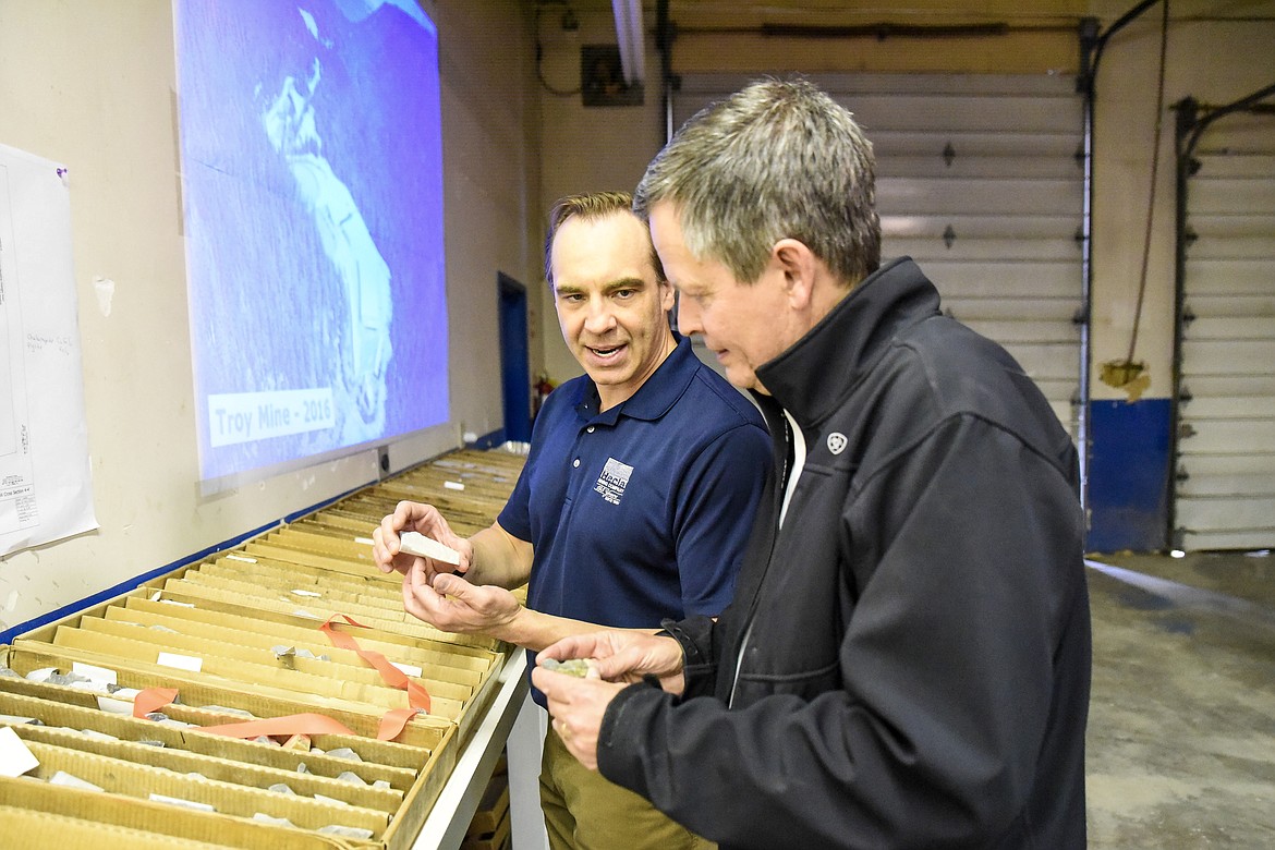 Doub Stiles, manager of Montana Operations for Hecla Mining, discusses core samples from the Montanore mine with U.S. Sen. Steve Daines at the Montanore offices in Libby Friday. (Ben Kibbey/The Western News)