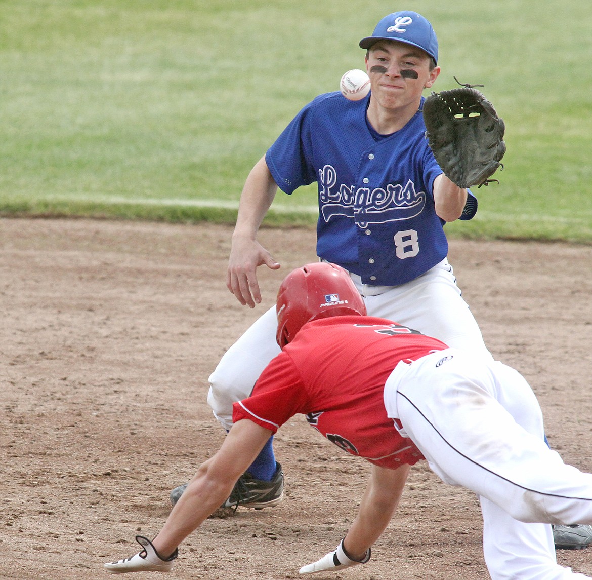 Second baseman Alex Svendsbye about to put the tag on Cranbrook's Quinn Grist as he attempts to steal for the first out top of the fifth in the first of a doubleheader. Loggers over Bandits 6-4 in the seven inning contest. (Paul Sievers/The Western News)