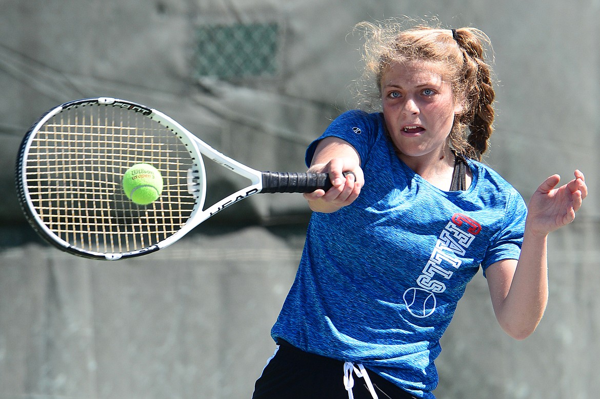 Columbia Falls' Hannah Schweikert hits a return in a girls' singles match against Miles City's Emily Toennis at the Class A State Tennis Tournament at Flathead Valley Community College on Thursday. (Casey Kreider/Daily Inter Lake)