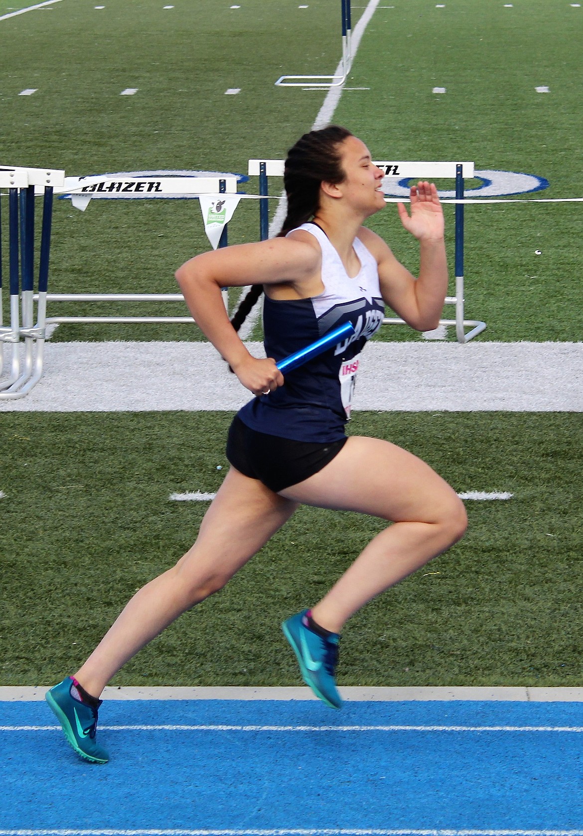 Photo by TERESA RAE
Jennifer Schmitz pushing herself in a relay race.