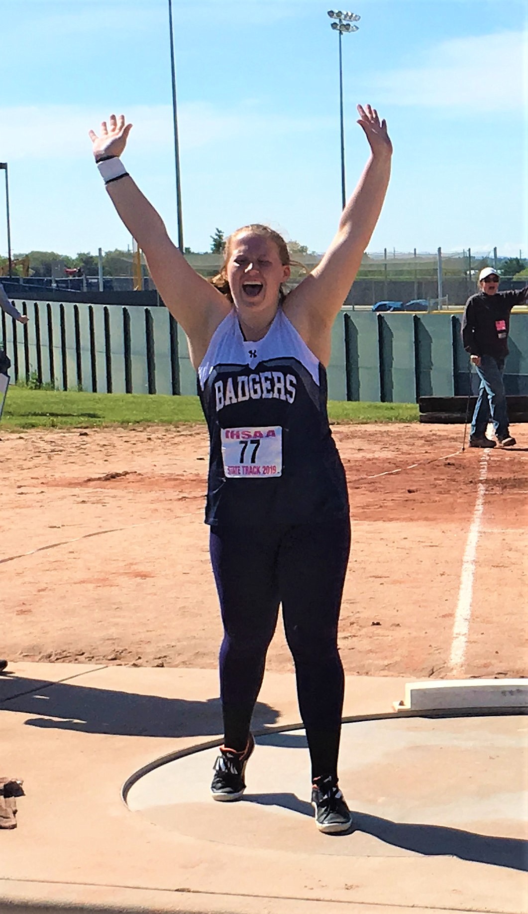 Photo by TERESA RAE
Victoria Rae celebrates winning the 3A shot put event for the second straight year on Saturday.