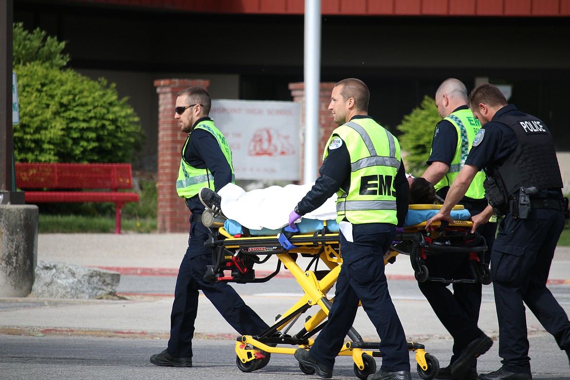 (Photo by MARY MALONE)
Sandpoint High School senior Curtis Hauck is transported to Lifeflight during the mock DUI scenario, &quot;Operation Grad Night,&quot; Tuesday at Sandpoint High School.