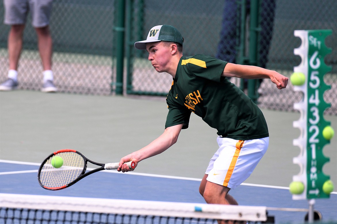 Whitefish&#146;s Brendon Buls fires a shot back at his opponent during the Class A state tennis tournament last week at Flathead Valley Community College. Buls earned second place in singles play at the tourney. (Photo courtesy Jeff Doorn)