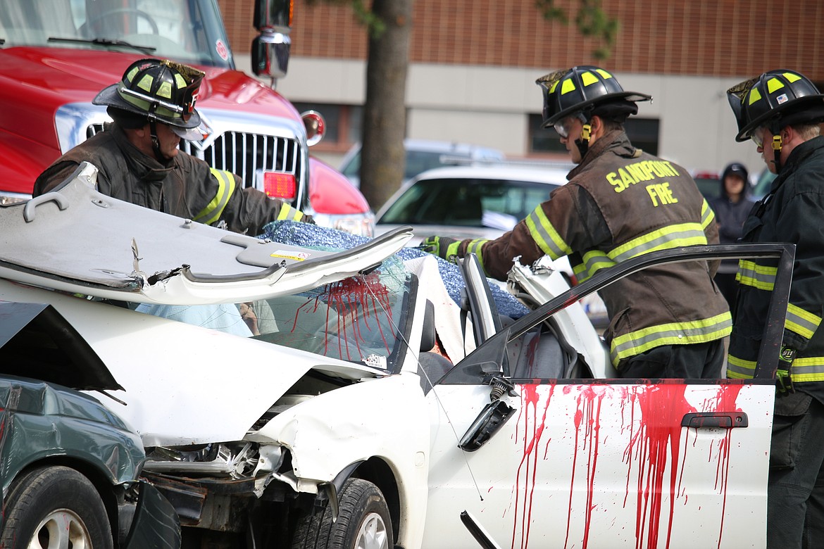 (Photo by MARY MALONE)
Local emergency crews and high school seniors from across Bonner County participated in a mock DUI scenario, &quot;Operation Grad Night,&quot; Tuesday at Sandpoint High School.