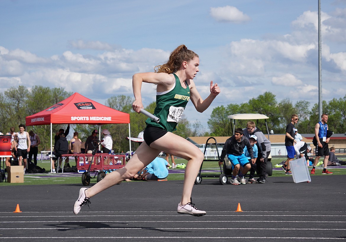 Bulldog Lauren Schulz leads off the girl&#146;s 4x400 relay team at the state track meet in Laurel. (Photo courtesy Matt Weller)