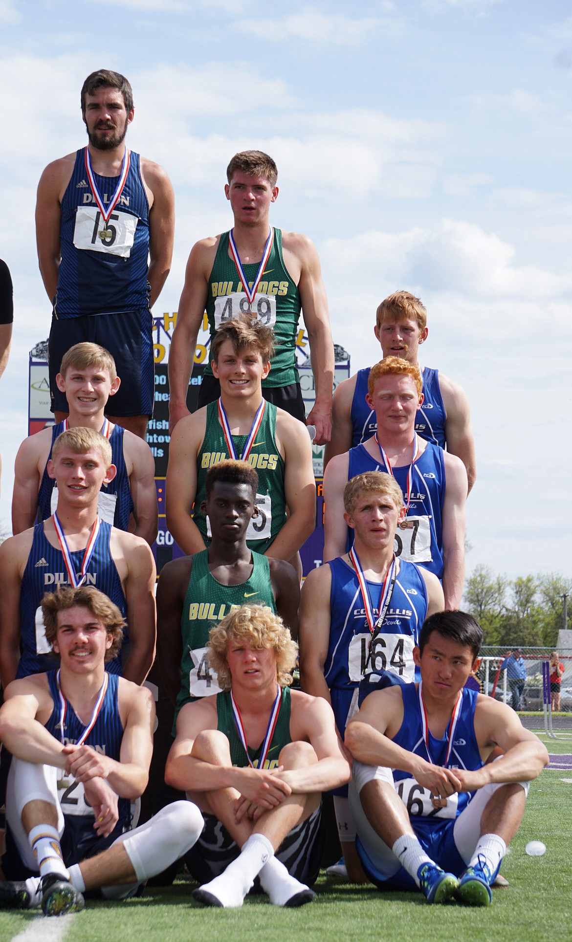 Bulldogs Lee Walburn, Jack Schwaiger, Marvin Kimere and Josh Dudley on the podium in fifth place for the 4X400 relay at the state track meet in Laurel. (Photo courtesy Matt Weller)