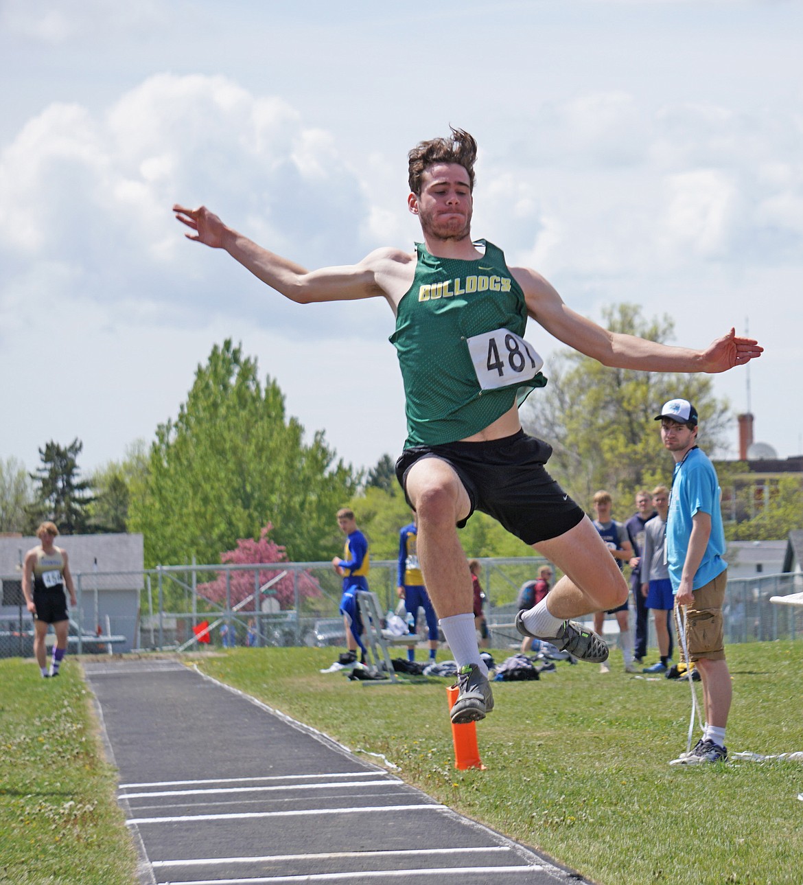 Bulldog Sam Menicke competes in the triple jump at the state Class A track meet in Laurel. (Photo courtesy Matt Weller)