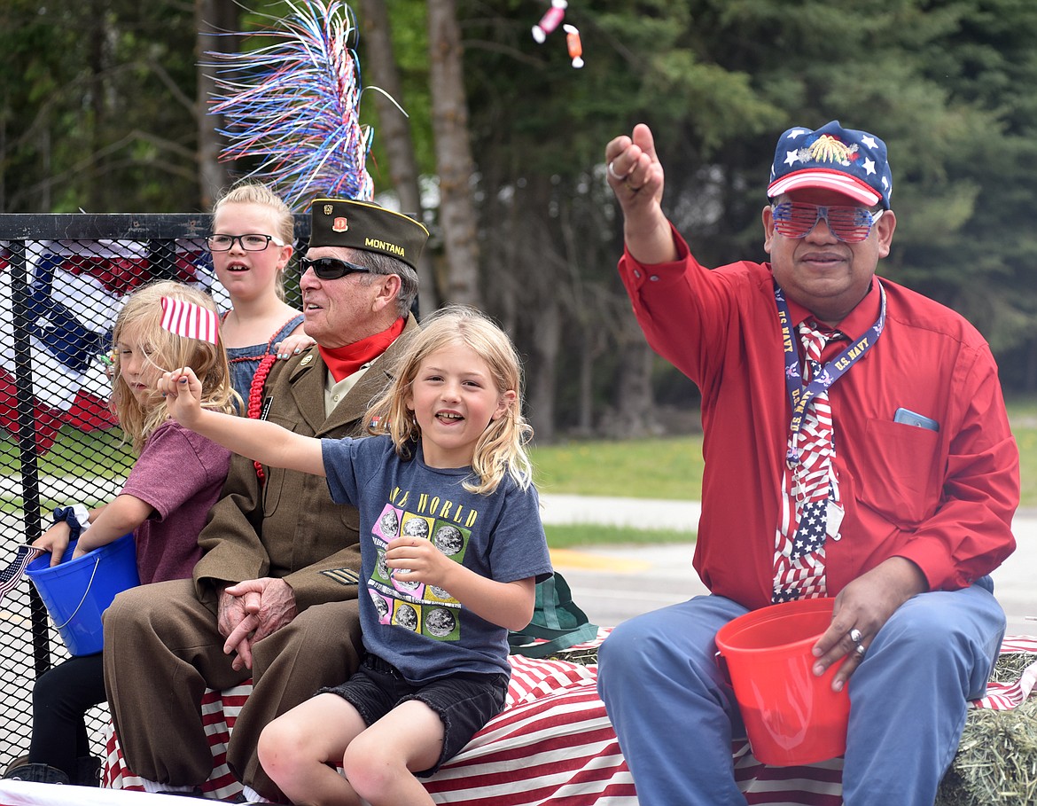 A float makes its way down Second Street during the Memorial Day Parade on Monday. (Heidi Desch/Whitefish Pilot)