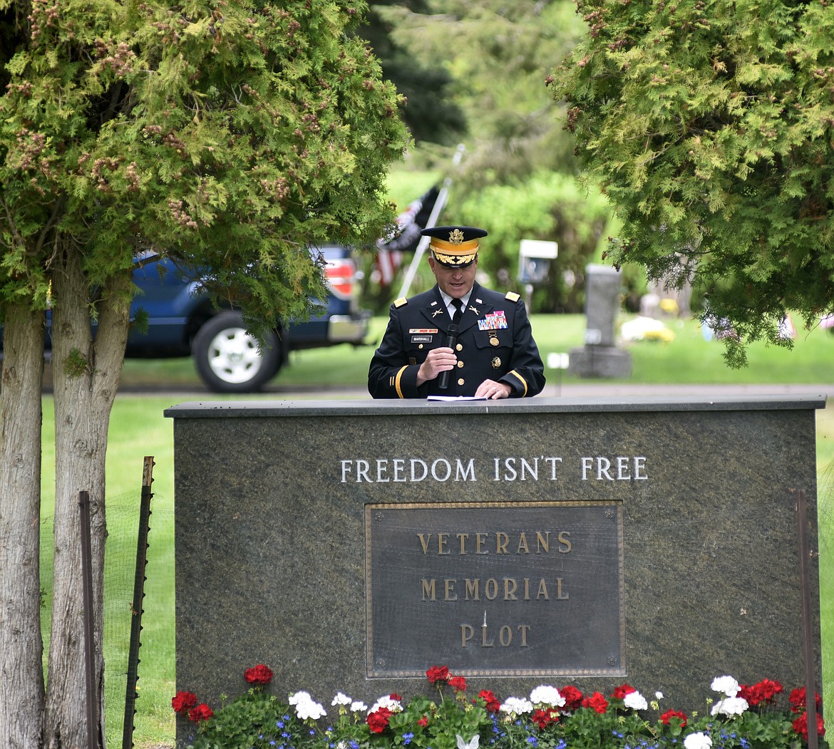 Retired U.S. Army Colonel Ward E. Marshall served as guest speaker for the Memorial Day Ceremony Monday at the Whitefish Cemetery following a parade down Second Street. The Whitefish&#146;s Lion Mountain VFW Post 276 sponsored the Memorial Day events. (Heidi Desch/Whitefish Pilot)