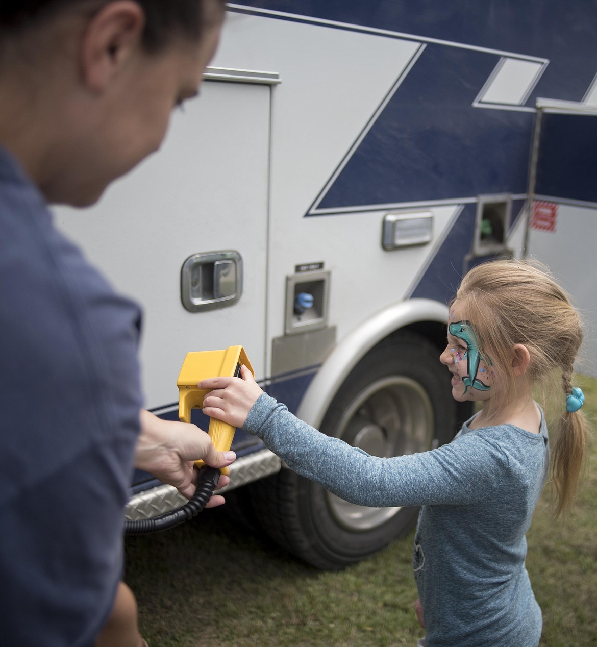 Troy Volunteer Ambulance member Amy Snow, left, lets Sybil Tucker remote control an oxygen tank, Wednesday at the McCormick School Rendezvous. (Luke Hollister/The Western News)