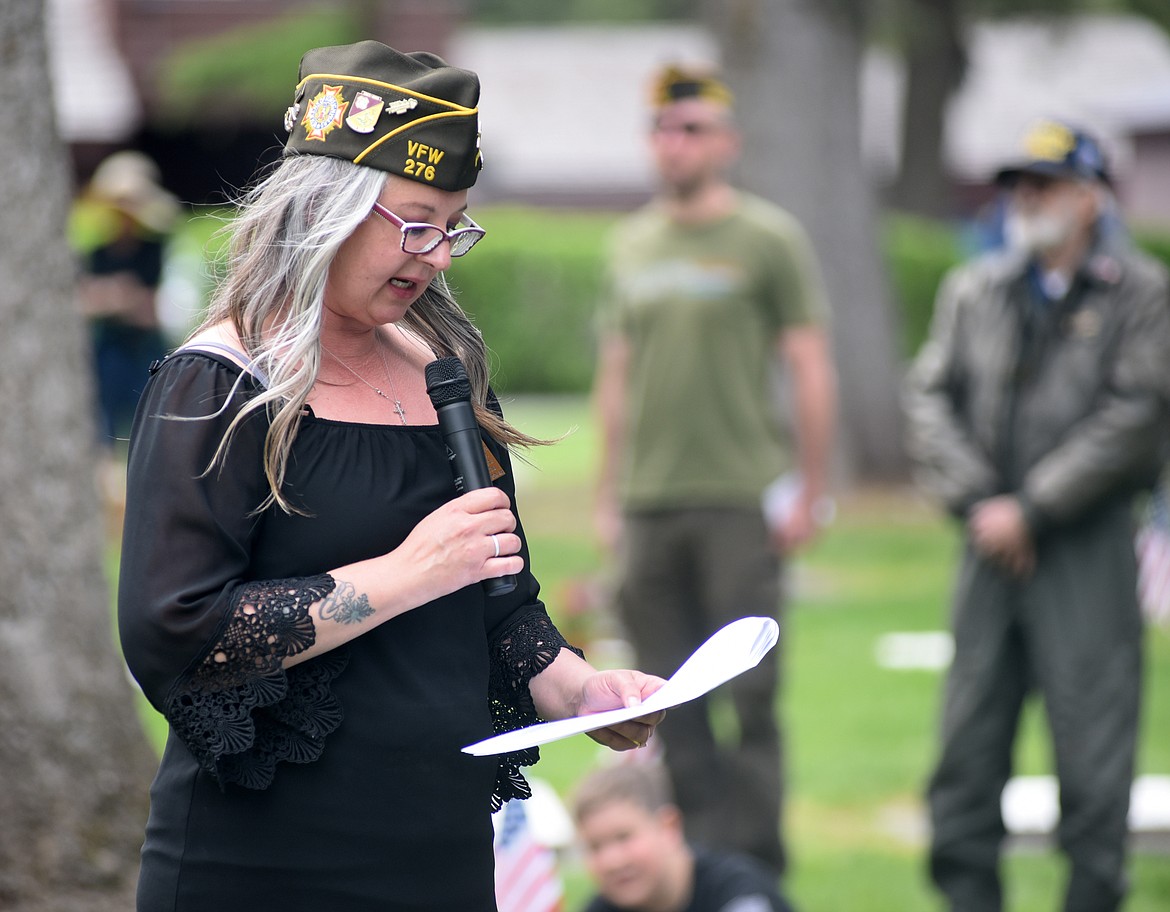 Sheila Schwegel-Coulter, Whitefish&#146;s Lion Mountain VFW Post 276 Quartermaster, speaks during the Memorial Day Ceremony Monday at the Whitefish Cemetery. (Heidi Desch/Whitefish Pilot)