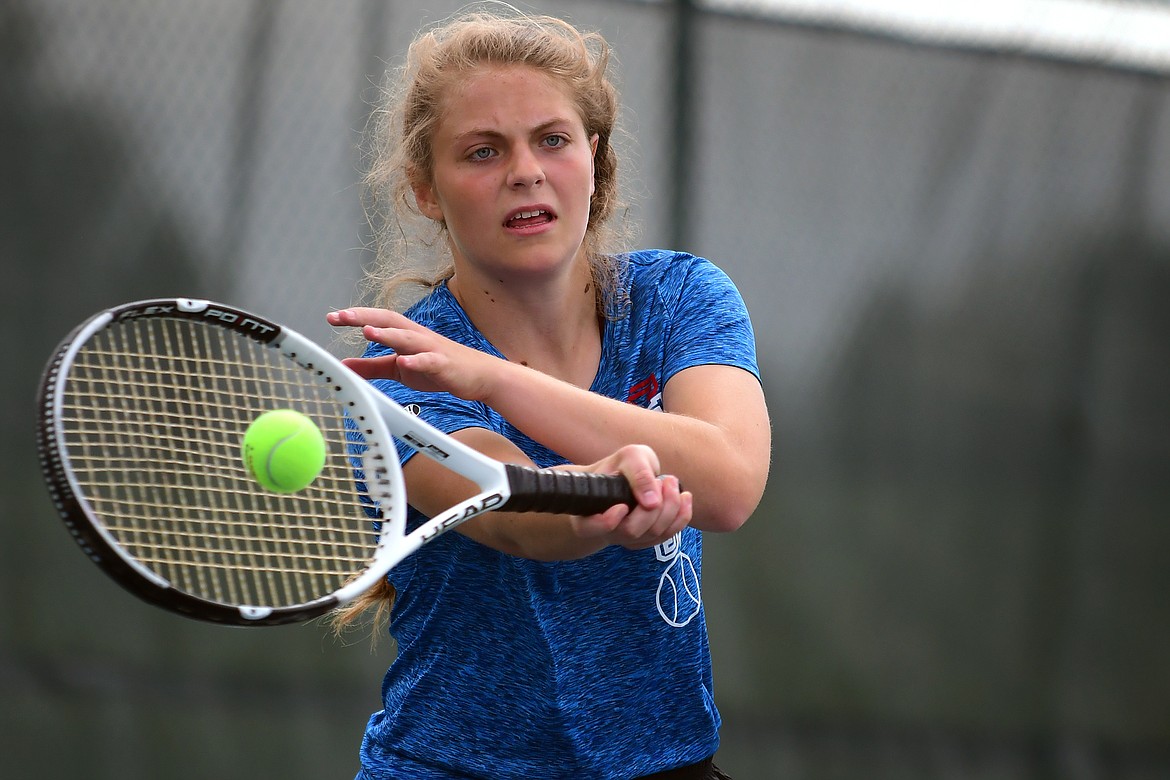 Hannah Schweikert takes on Whitefish&#146;s Lauren Brown in the first round of the Western A Divisional Tennis Tournament at FVCC Wednesday. (Jeremy Weber photo)