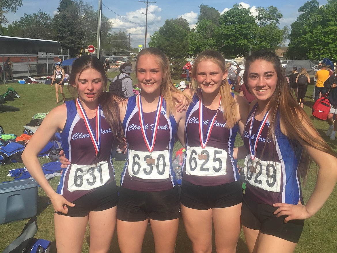 SORREN REESE, Kylie Plakke, Emmah Baughman and Hunter McGillivray placed fourth in the 1,600-meter relay in Class C at the State Track Meet in Laurel on May 25. (Courtesy photo)