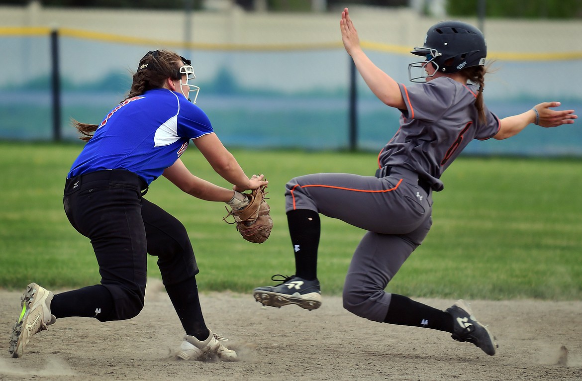 Alyssa Blankenship tags out Frenchtown runner Charity rebich in the seventh inning Tuesday. (Jeremy Weber photo)