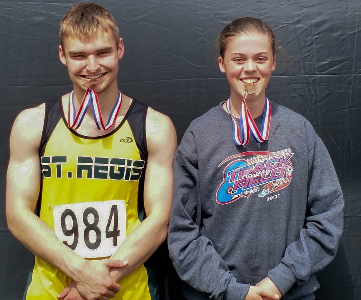 IAN FERRIS, left, placed sixth in the long jump with a leap of 20 feet, 4 inches and Madison Kellyearned sixth in the 1,600-meter dash with a time 4:19.45 in Class C at the StateTrack Meet. (Courtesy photo)