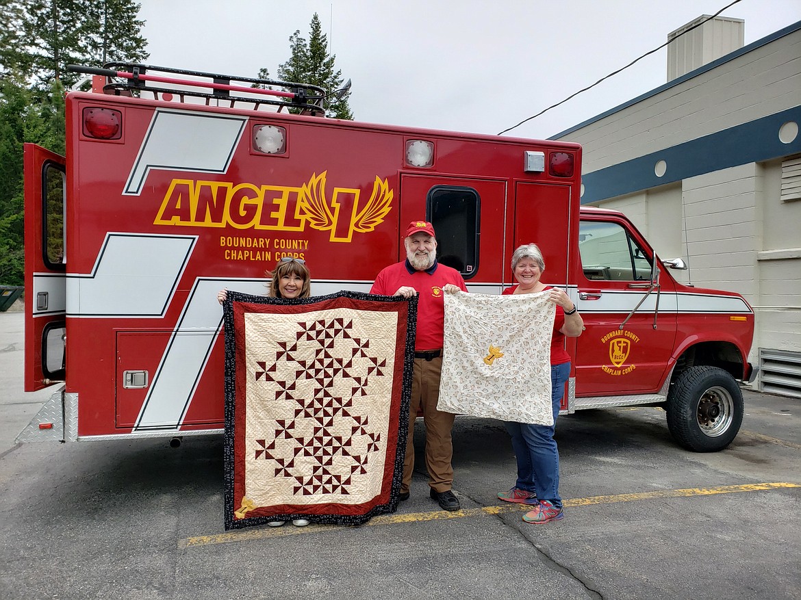 Photo by SANDY STEINHAGEN
The Hall Mountain Volunteer Fire Association Ladies Auxiliary hand made and donated three quilts to the Boundary County Chaplain Corp.