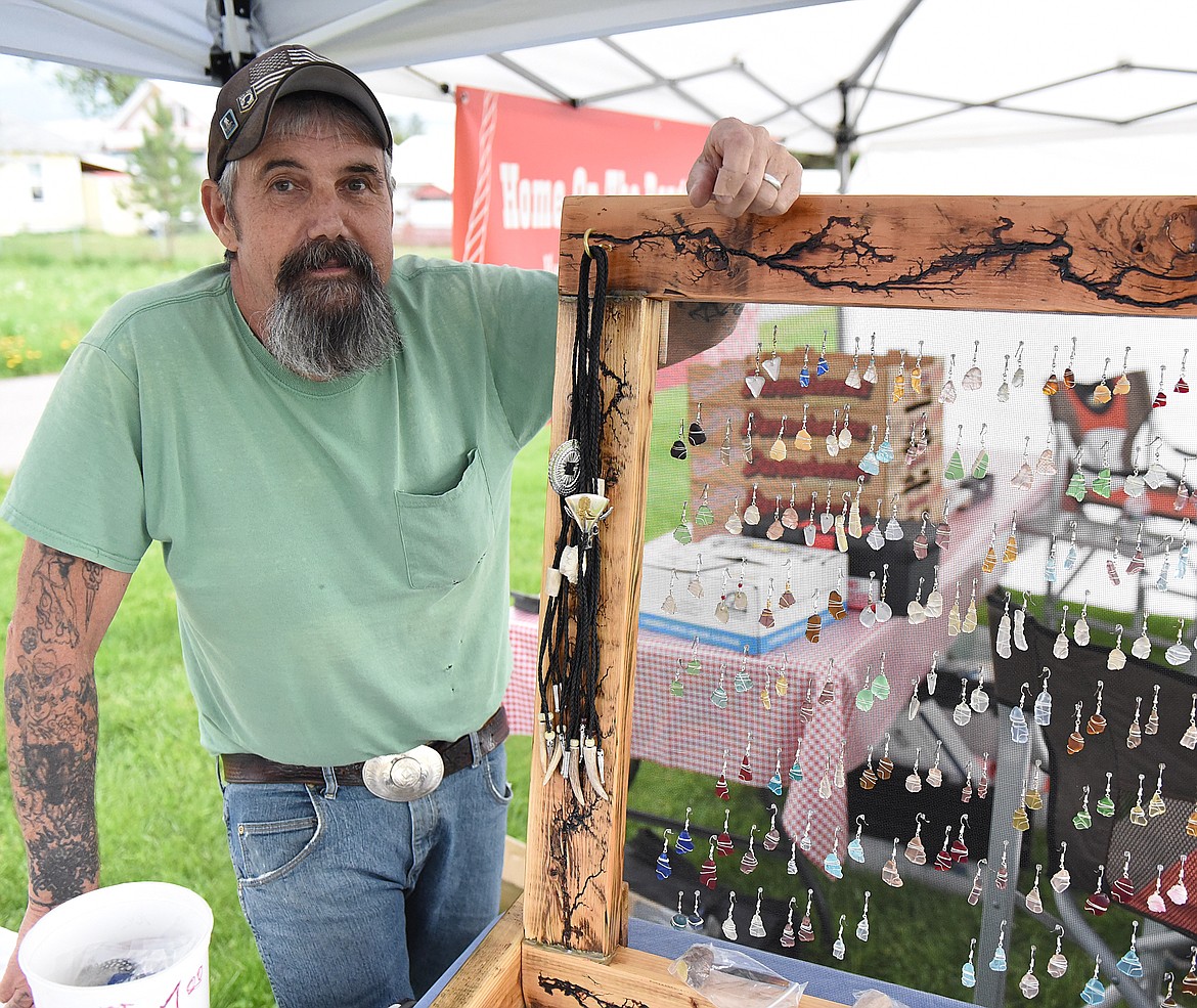 BILL HOUCK of Ronan displayed quite an array of handmade jewelry at his booth last Thursday. The items are made of deer and elk horns, sea glass, bone beads and much more. He also has fractal burn wood.