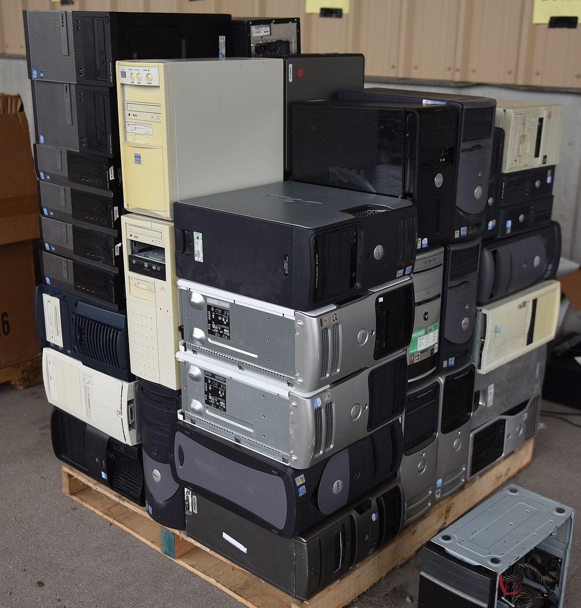 A PALLET stacked with obsolete &#147;towers.&#148; What formerly weighed in at 30 or 40 pounds is replaced by what can fit in your hand.