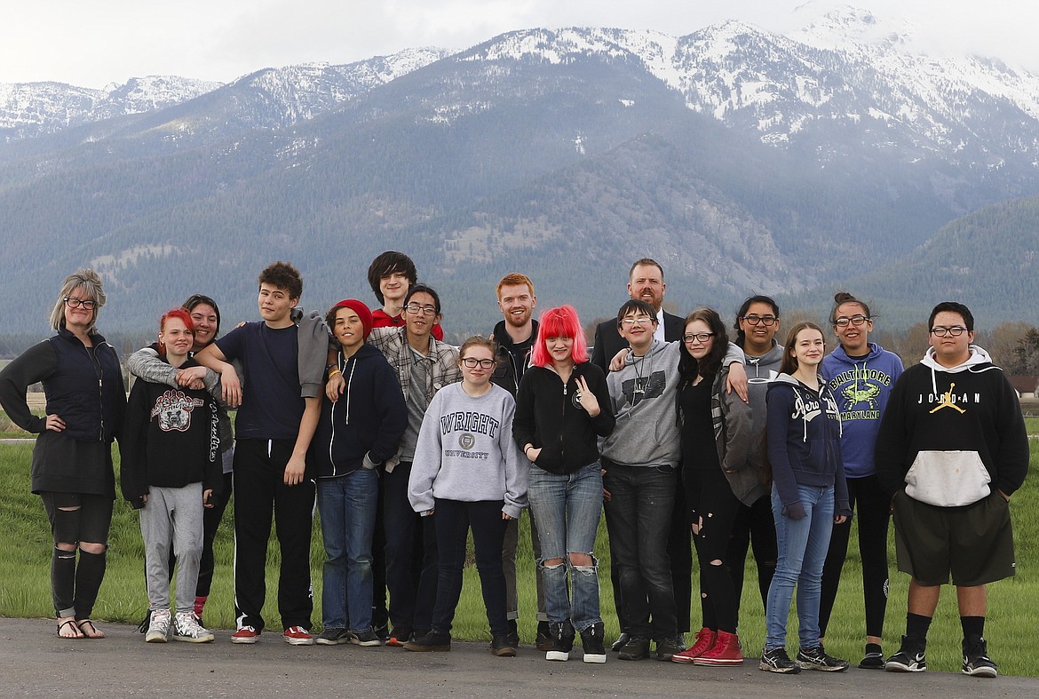 STAFF AND students were involved in the making of &#145;A Day to Remember&#146; gather for a photo with the Mission Mountains as the backdrop.