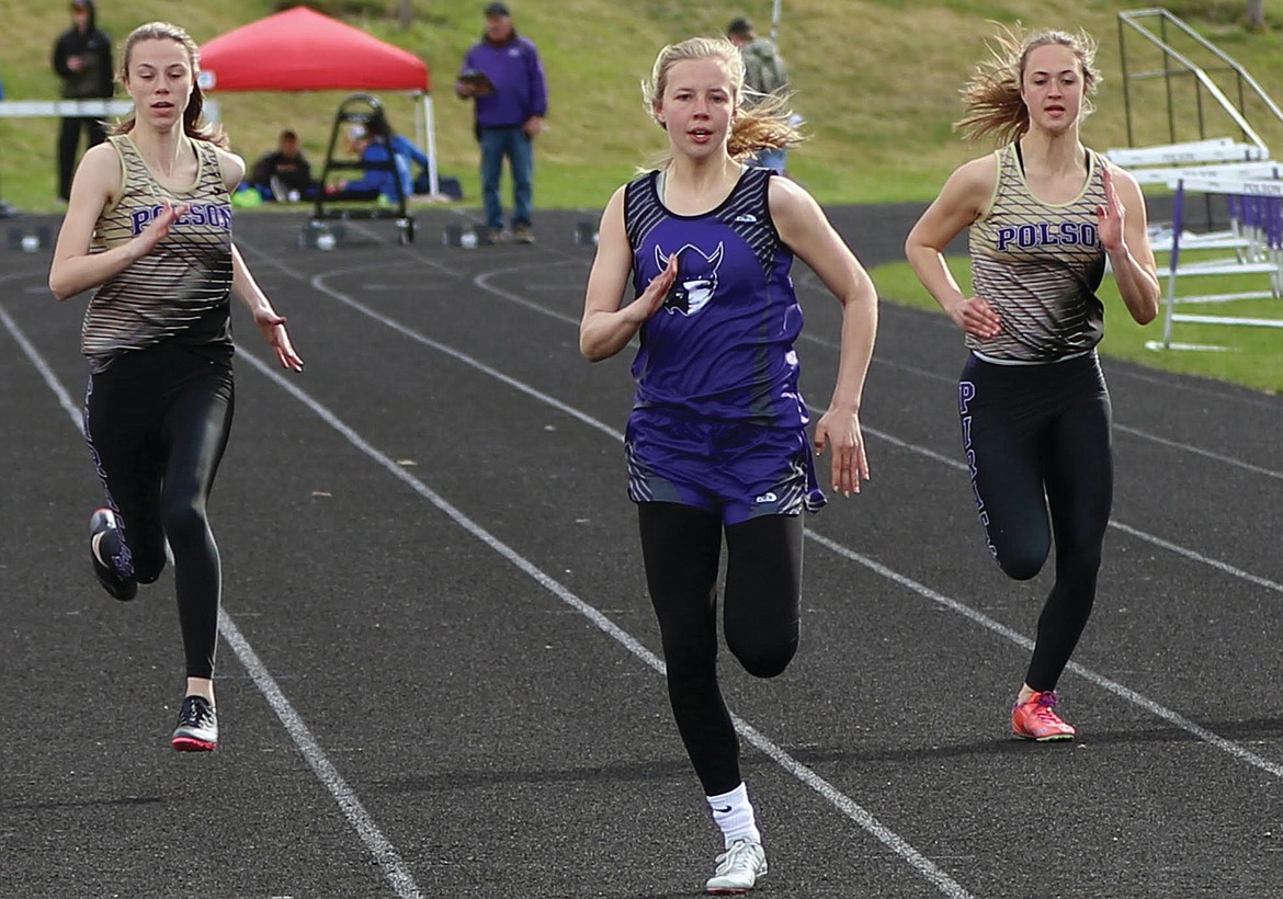 CHARLO HIGH School runner Carlee Fryberger (middle) captures first-place in a regular season track meet. Fryberger, had a dominant performance in the MHSA Class C state track meet May 24-25 at Laurel Sports Complex at Laurel High School. (photo courtesy of Bob Gunderson)