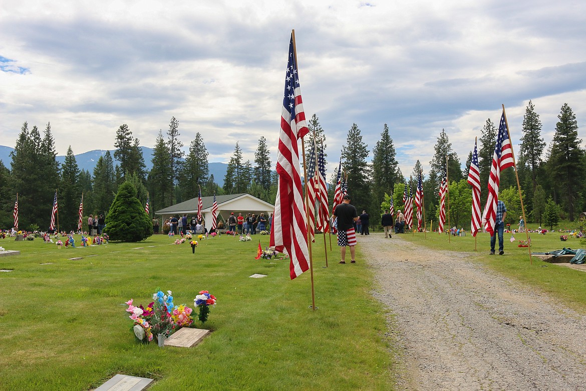 Photo by MANDI BATEMAN
Flags lining the roadway.