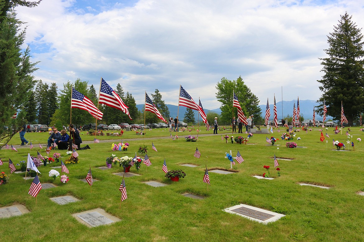 Photo by MANDI BATEMAN
Flags adorned the road and veteran&#146;s graves on Memorial Day.