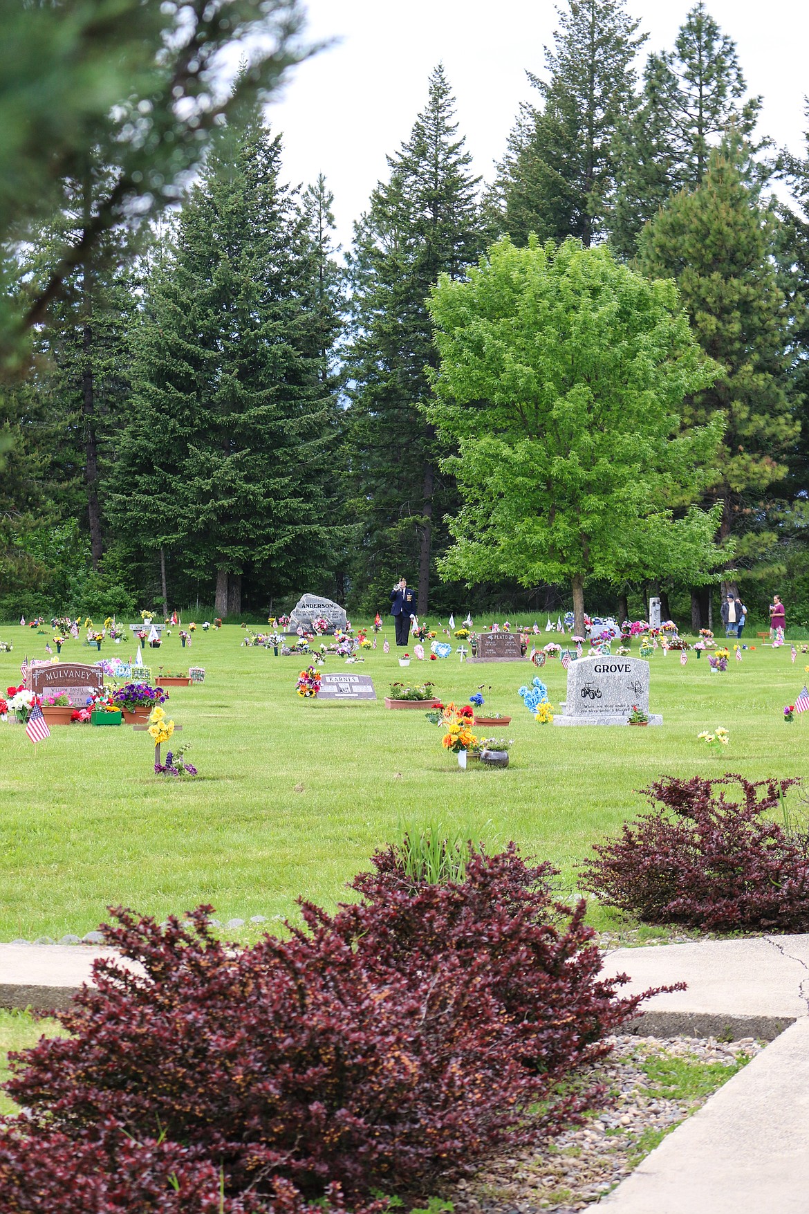 Photo by MANDI BATEMAN
Bugle Taps played from across the cemetery.