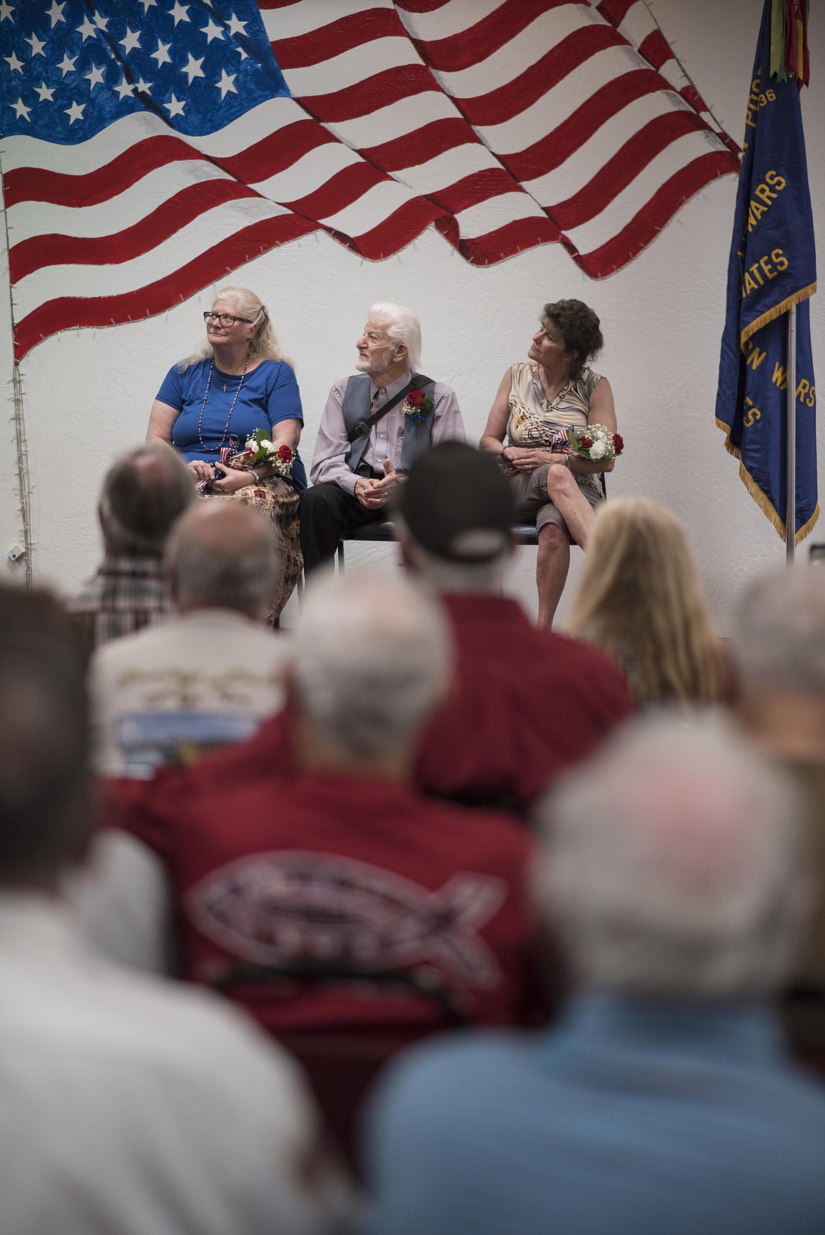 John Alex, middle, waits with family members to receive the Montana Congressional Veteran Commendation, Friday at the Libby Veterans of Foreign Wars Post 1548. (Luke Hollister/The Western News)