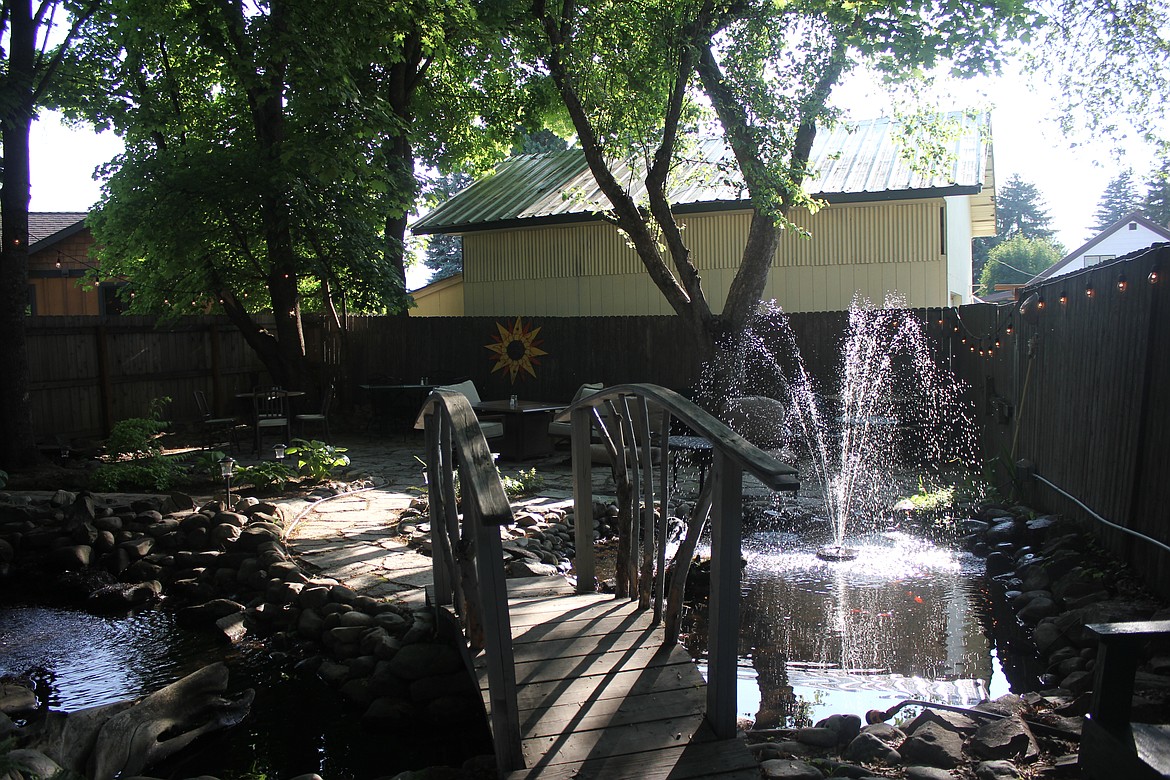 Photo by TANNA YEOUMANS
With a &#147;secret garden&#148; feel, the outdoor seating area boasts a water fountain and a picturesque setting.