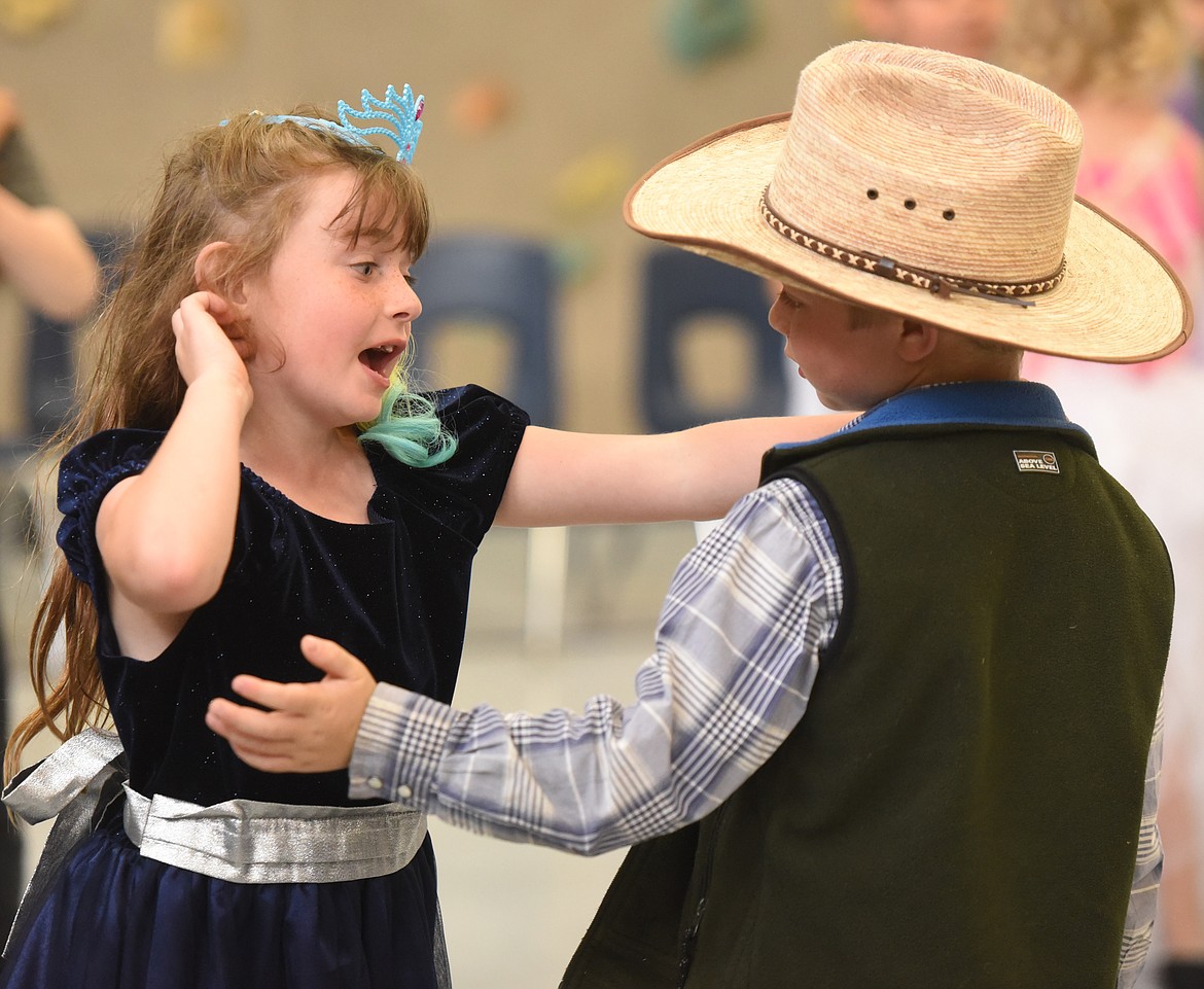 SCARLETT ANCIAUX shows her style while dancing with Landon Dolberry during &#147;Cinderella&#146;s Ball.&#148;