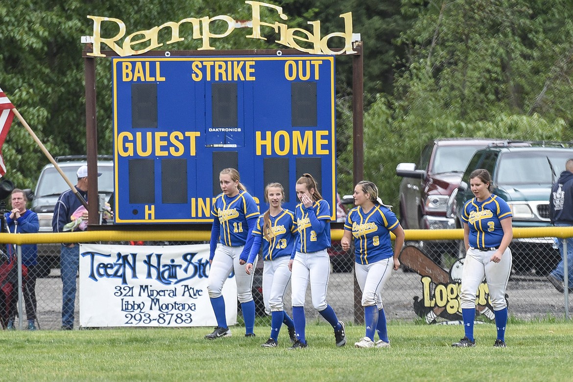 Libby&#146;s seniors, Cerria Swagger, Linsey Walker, Samantha Miller, Emily Carvey and Sammee Bradeen take their final walk at Remp Field after their final game May 18. (Ben Kibbey/The Western News)