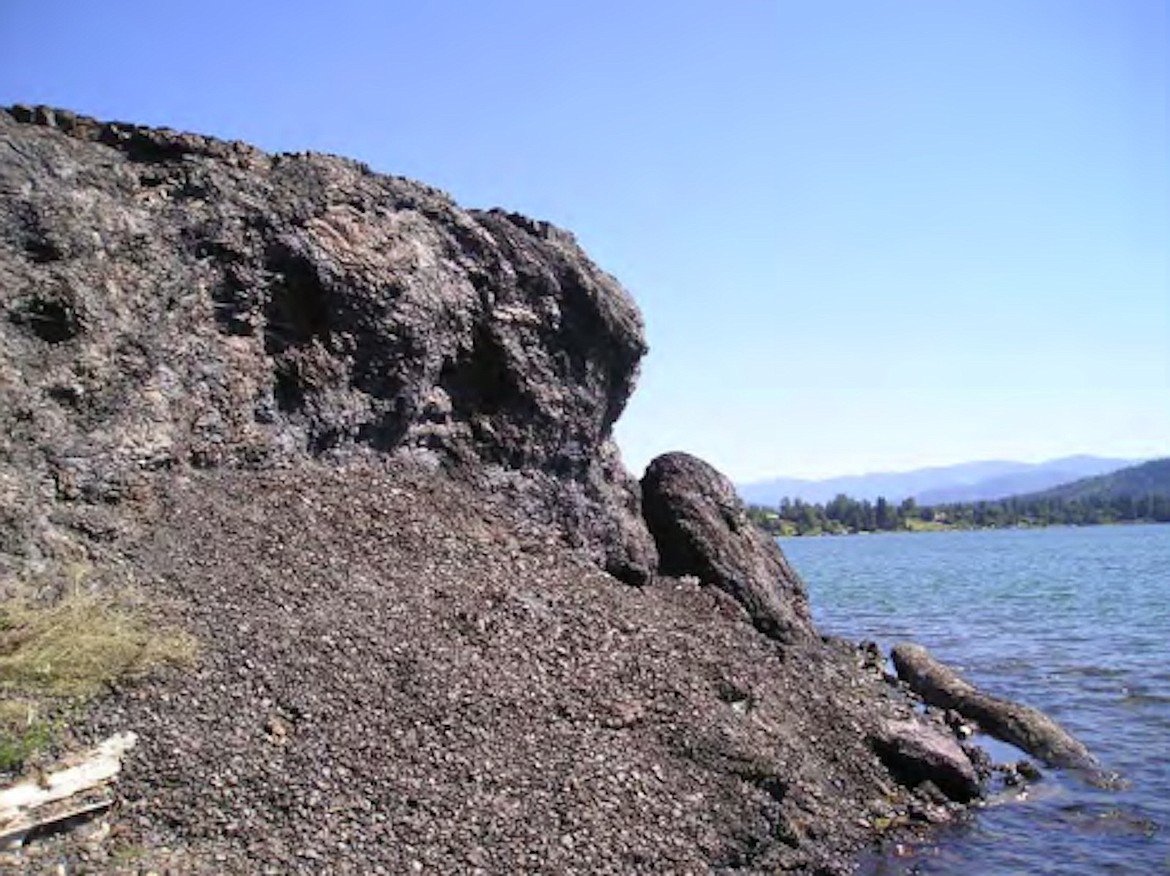 (Photo courtesy IDEQ)
This photo taken by the Idaho Department of Environmental Quality shows the base of the slag dump known as Black Rock eroding.