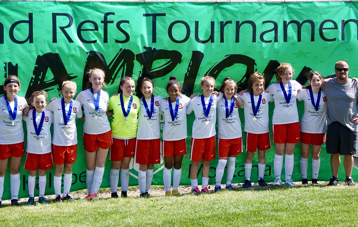 Courtesy photo
The Thorns &#146;07 Girls White soccer team won U12 girls silver bracket in the 3 Blind Refs Tournament in Kalispell, Mont., this past weekend. The team defeated the Canadian AirDrie 5-1 in the championship game on Sunday afternoon. From left are Allie VanDitto, Olivia May, Emma Decker, Nicole Stewart, Emma Singleton, Danielle Todd, Jamie Lawrence, Lily Smith, Mallory Judd, Malina Biondo, Hanna Coyne, Zayda Voigt and coach Kirk Hartzell.