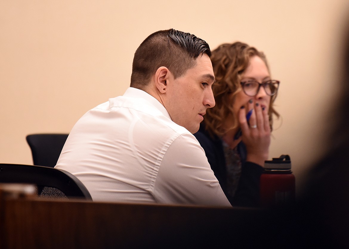 Ryan Cody Lamb with his defense team on Friday, June 7, at the Flathead County District Court. Lamb has been charged with felony deliberate homicide after being accused of stabbing his partner Ryan Nixon on Aug. 5, 2018.(Brenda Ahearn/Daily Inter Lake)