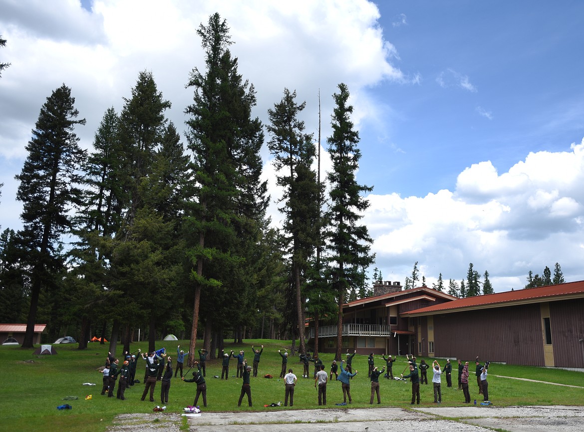 Members of the Montana Conservation Corps conduct a wilderness preparation class on Friday, May 24 at Camp Ponderosa. They were on site to help with the clean up and revitalization of the property which is being turned into a veterans center by Allen and Linda Erickson of the Northwest Montana Veterans Food Pantry.