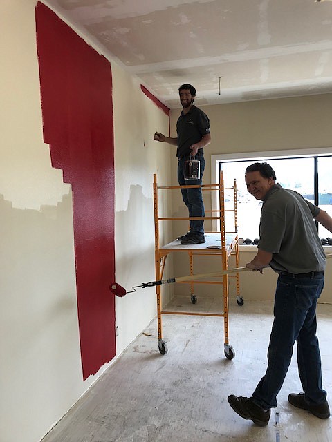 Courtesy photo
Zachary Bruno, left, and store manager Jeff Reimer paint the new Benjamin Moore Mallory Paint Store opening soon at 2611 N. Government Way.