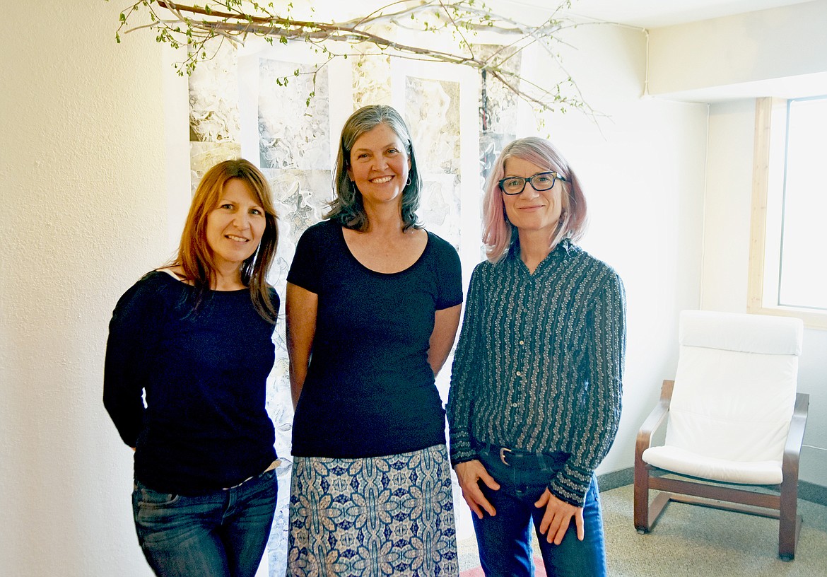 Artists Heidi Marie Faessel, Jenny Bevill and Olivia Stark are the main organizers of a one-night only art exhibit for the Flathead Valley Women in the Arts at Stark Gallery downtown. (Heidi Desch/Whitefish Pilot)