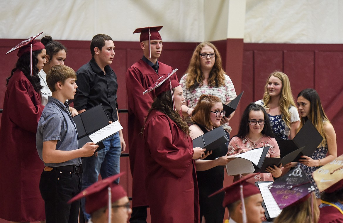 The Troy High School Choir performs &#147;One Voice&#148; Saturday at Troy&#146;s graduation. (Ben Kibbey/The Western News)