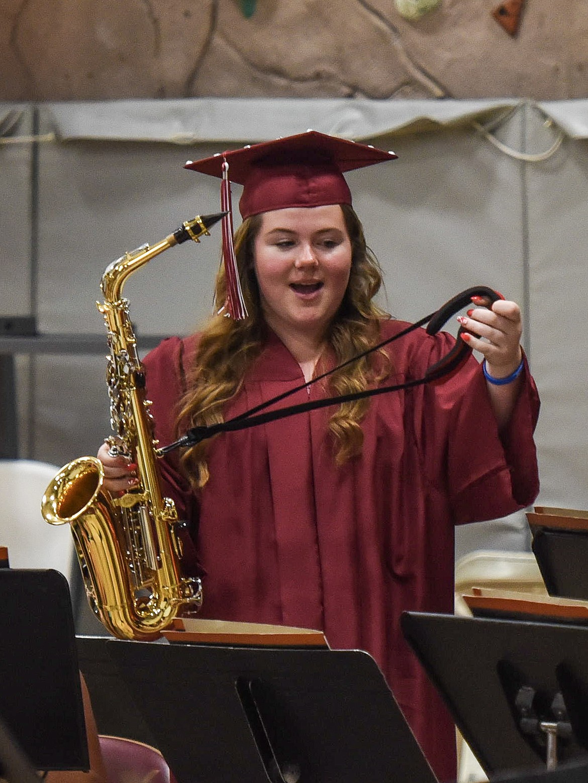 Troy High School&#146;s Tristyn Winebark prepares to join the band in playing &#147;Old Devil Moon,&#148; Saturday at Troy&#146;s graduation. (Ben Kibbey/The Western News