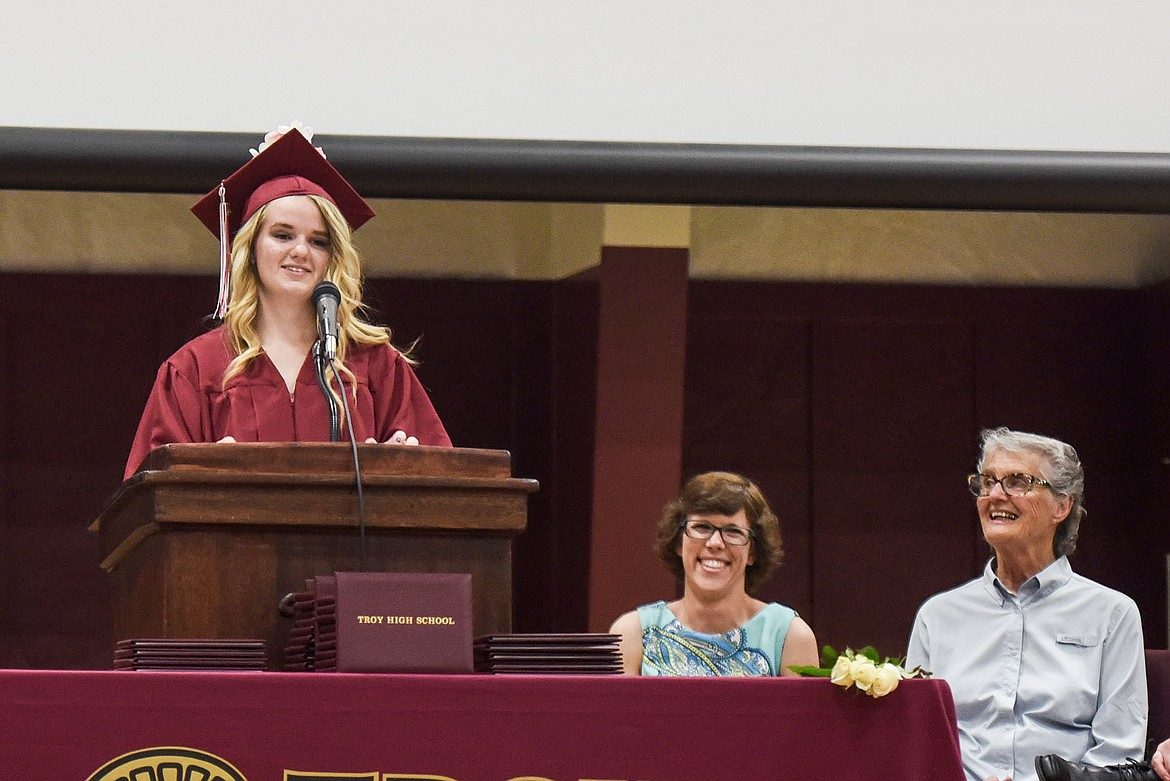 Troy High School&#146;s Paige Chapel introduces honorary speaker -- and Troy Spanish teacher -- Tabitha Maust, Saturday at Troy&#146;s graduation. (Ben Kibbey/The Western News)