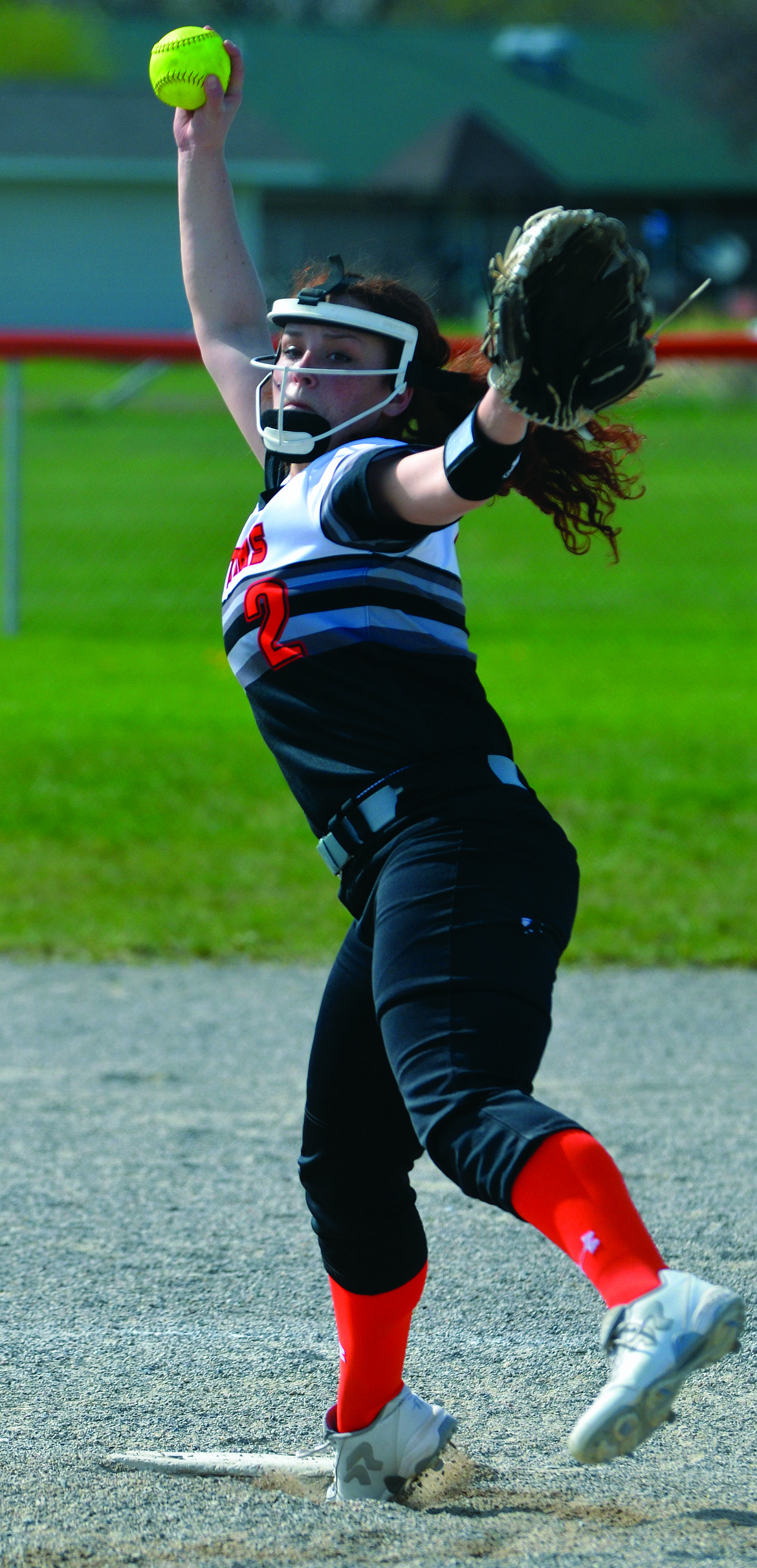 PLAINS-HOT Springs pitcher Kassidy Kinzie delivers a pitcher in a regular season game against Mission-Arlee-Charlo at Plains High School. Kinzie was one of the instrumental players in the Trotters&#146; quest for a championship, and eventual third-place MHSA Class B-C finish at state. (Jason Blasco/Valley Press)